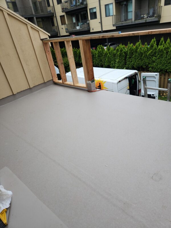 Clean, finished result showing new siding and sealed eaves – Final result of Portland roof inspection and rot repair project in SE Portland.