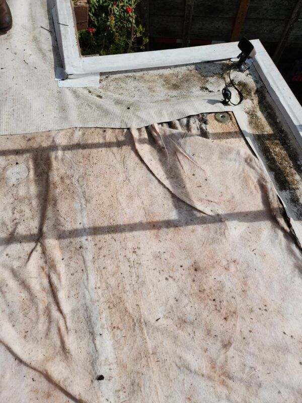 Replacing rotted sections of roof deck during Scappoose repair job
